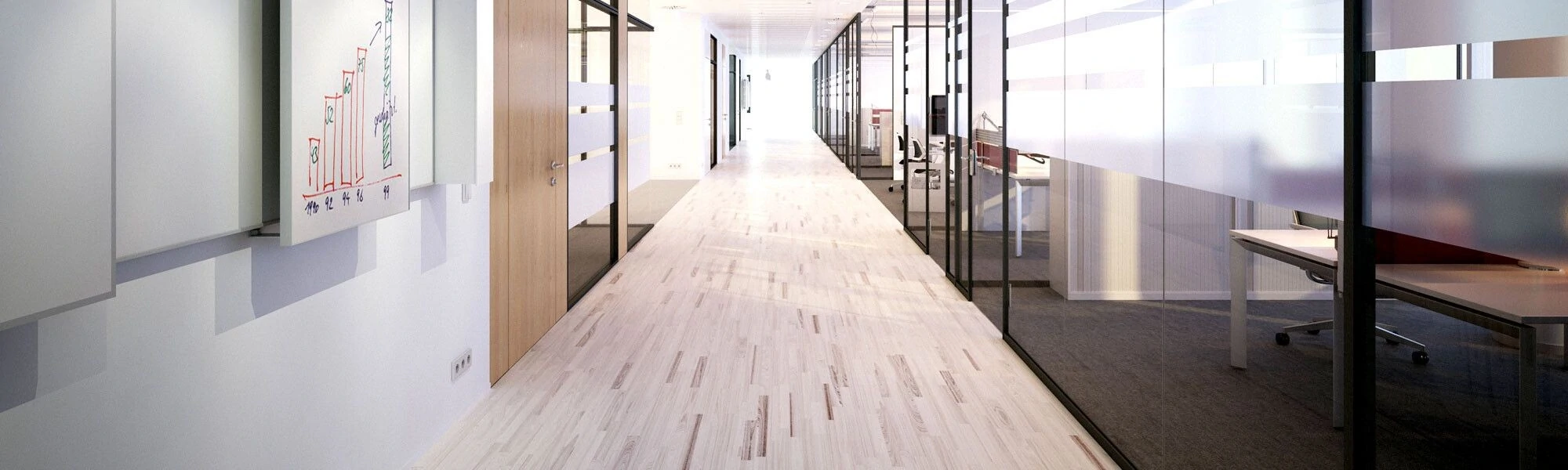 Modern office hallway featuring glass-walled meeting rooms Modern office hallway featuring glass-walled meeting rooms